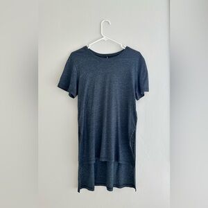 Truly Madly Deeply navy shirt with a long back and graphic design on the back